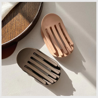 Pince à cheveux de couleur unie